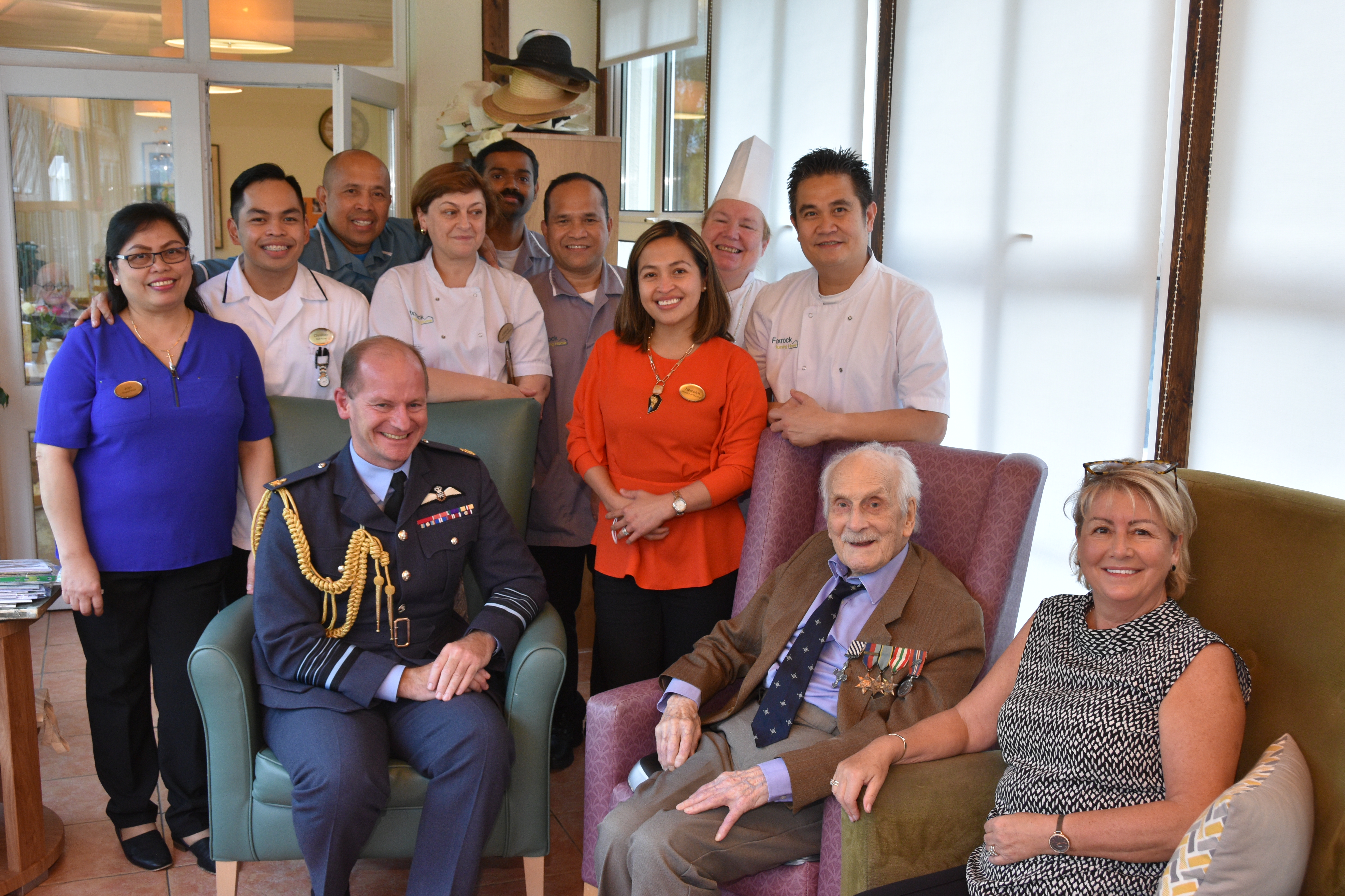 Group Captain (retired) John ‘Paddy’ Hemingway and Air Chief Marshal Sir Mike Wigston with Care Home staff.